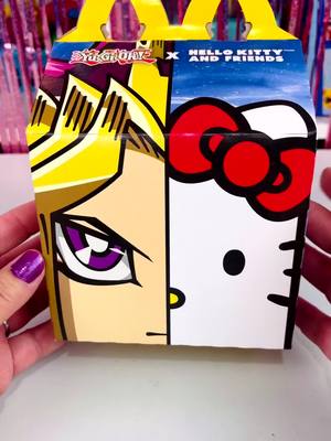 A post by @lilmisstoycollector on TikTok caption: Yu-Gi-Oh X HelloKitty #hellokitty #mcdonalds #happymeal #kawaii #sanrio 