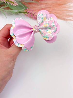 A post by @miss.o.crafts on TikTok caption: New Scalloped Pinch Hair Bow Tutorial! 🎀✨ Learn how to make this adorable accessory with ease using my plastic hair bow template # 166, available now in my TikTok shop! Perfect for adding a touch of sweetness to any hairstyle. Don't miss out – grab yours today! #DIYHairBow #HairAccessories #TikTokTutorial #DIYHairAccessories #fauxleatherbows #HairBowTutorial #DIYHairBows #DIYCrafts #diyproject 