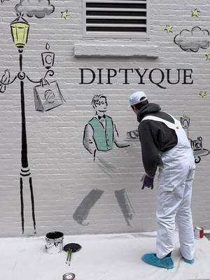 A post by @clymdraws on TikTok caption: #CLYMDRAWS x #DIPTYQUE #Mural #StreetArt #NYC #Paris #Cafe #NewYork #fyp @diptyque Paris 