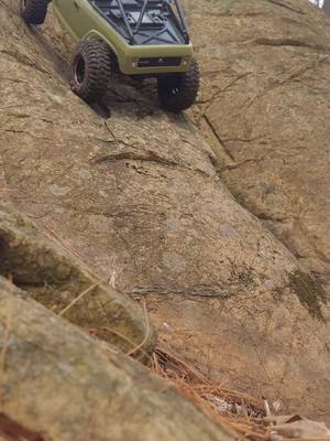 A post by @hikingandrcs on TikTok caption: out running the rocks! #offroad #rccrawling #vanquish 