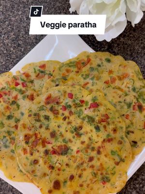 A post by @mysoulnm on TikTok caption: Veggie paratha for breakfast 😋 پراته سبزیجات برای صبحانه  #l #viral #viralvideo #viraltiktok #fyp #afghanistan🇦🇫 #afghanwomen #foods #qurootirecipe #mashpulaorecipe #ash #icecoffee #lasagna #shorba #lasagnarecipe #icecream #cakerecipe #cocanutcake #qabuli #uzbekpulao #raisincake #cakerecipe #pancakerecipe #pancakes #pancake #chickenkarahi #burgerafghani #alooopakore #pakawrakachalo #creamrolls #paratha #paratharecipe #creamrollrecipe #پکوره #پکوره_کچالو_خیلی_خوشمزه😋 #پکوره_کچالو #برگر_افغانی #كوفته #کربم_رول 