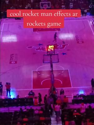 A post by @mattklockmadeit on TikTok caption: Cool effects pregame at rockets game on the rocket man half court #fyp #houstonrockets #NBA 