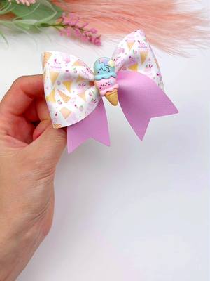 A post by @miss.o.crafts on TikTok caption: 🍦🎀 Indulge in sweetness with this Ice Cream Hair Bow Tutorial! 🎀🍨 Create this delicious accessory in minutes using my plastic hair bow template # 162, now in stock at my TikTok shop. Treat yourself to a scoop of style – grab yours today! #DIYHairBow #SweetStyle #TikTokTutorial 