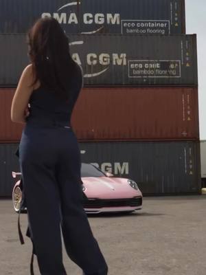 A post by @jackiebaker500 on TikTok caption: Carti really went off on carnival 🎠🎡 Color: gloss peach pink #cars #cryptocurrency #investment #porsche #pinkcar #cargirl #911carrera