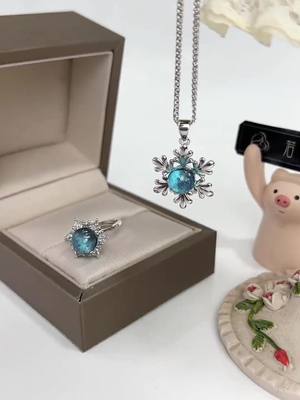 A post by @hairmemorial on TikTok caption: Snowflake Hair Memorial Set#hairmemorial #commemorativejewelry 