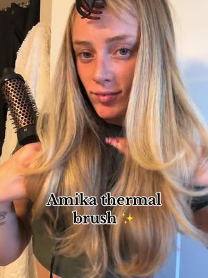 A post by @ashtyn.ann on TikTok caption: @amika thermal brush is one of my fav tools to a skinny blowout 😍 #blowout #amikapartner 