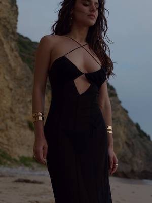 A post by @ndglt_brand on TikTok caption: Summer sunset in Portugal 😍 #resortweardress #holidaydress #sexydress #beachlife #longdress #ndgltbeachwear #ukrainianbrand #beachlifestyle #madeinukraine #portugal #portugal🇵🇹 