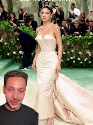 A post by @itsrafaelgarcia on TikTok caption: #greenscreen Met Gala Review: Kylie Jenner ⭐️  Really love the simplicity of this look I think she looks like a timeless beauty! Thoughts? #metgala #metgala2024 #kyliejenner #fyp #foryou #oscardelarenta #fashiontiktok #redcarpetreview 