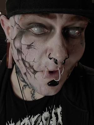 A post by @modifiedmechanism on TikTok caption: I mean, at least I'm still trying? #fiddledeedoo #fyp #foryoupage #makeup #maw #oc #sfx #contacts #demon #void #bad #best 