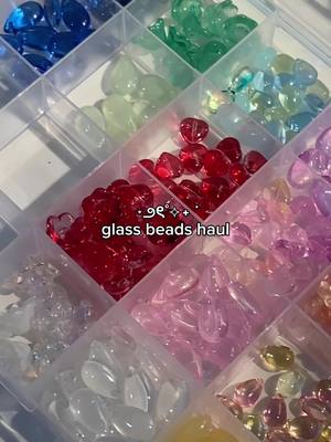 A post by @lovenao.shop on TikTok caption: another day, another bead haul 😼 #fyp #fyp≥ #foryou #xyzbca #beads #beadedjewelry #asmr #packingorders #packing #packingasmr #packaging #phonecharm #bracelet #SmallBusiness