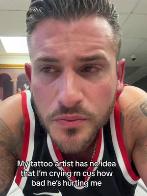 A post by @mikeylorenz0 on TikTok caption: Love/Hate relationship with tattoos. #painful #tattoos 