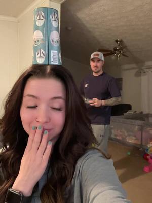 A post by @amber_marr13 on TikTok caption: My phone took the hit at the end. 🙈 #couplechallenge #foryoupage #justforfun #livingmybestlife 