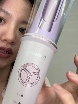 A post by @newmeofficial on TikTok caption: Get Salon-Quality Curls at Home with NewMe Curling Iron’s Revolutionary Features! #hairstyle #curlingiron #automaticcurler #newme #fypage 