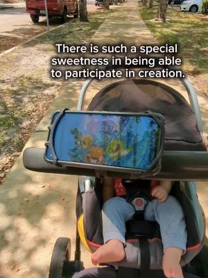 A post by @jennyxspace on TikTok caption: There is such a special sweetness in being able to participate in creation.#foryoupage #universalphoneholder #tiktokfinds #stroller #strollerhack 