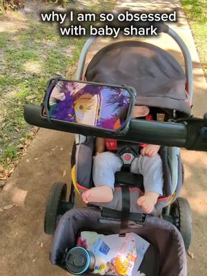 A post by @jennyxspace on TikTok caption: #strollerhack #stroller #tiktokfinds #universalphoneholder 