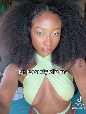 A post by @ase.jaiye on TikTok caption: slowly becoming a clip in girl 🤭 @UMI Hair Co. #fyp #clipinhairextensions #blackgirlhair 