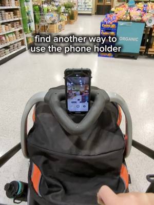 A post by @jennyxspace on TikTok caption: #universalphoneholder #tiktokfinds #stroller #stroller #strollerhack #foryoupage 