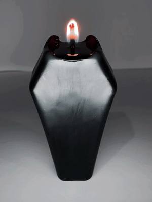 A post by @thatcandlestuff on TikTok caption: Would you burn a bleeding coffin candle? #fy #candlesoftiktok #horrortok #horror #candles #fypシ゚viral 