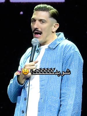 A post by @theandrewschulz on TikTok caption: Abu Dhabi has Gay People Now!… kinda 😁 Went back to UAE and brought my Chamaki stick just in case 💪 #andrewschulz #comedy #standupcomedy #abudhabi #dubai 