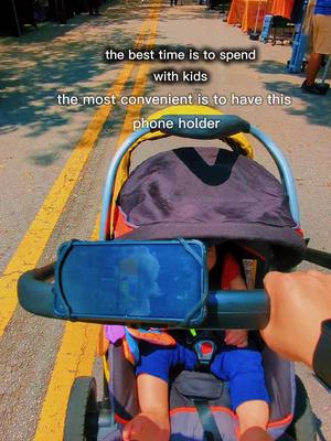 A post by @jennyxspace on TikTok caption: best time with best people and best product #tiktokshopsummersale #foryoupage #universalphoneholder #strollerhack #stroller #babystroller 