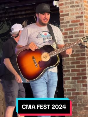 A post by @hjwoods_20 on TikTok caption: Surprise visit at @Luke’s32bridge on Broadway #cmafest #countrymusic #lukebryan #nashville