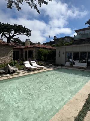 A post by @kambiz.ahmadi on TikTok caption: Before I share a full tour of this $30m Carmel Estate. Let me know what you think of the hidden pool? #luxuryrealestate #carmel #pebblebeach #pool 