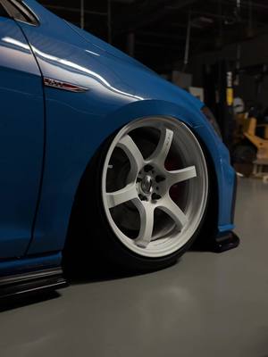 A post by @aidanquinn69 on TikTok caption: CFB aura #mk7 #gti #savethemanuals #rayswheels #cornflower #bagged #internetcar #carsoftiktok 