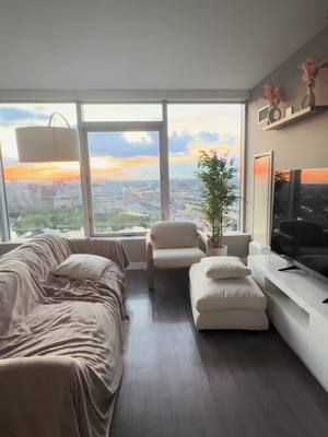 A post by @franknstien on TikTok caption: before & after 🥰✨  my bf @derekdeming & i’s hard work & dedication led to our furnished home! We still want to add some more decors in the coming future! #interiordesign #homedecor #sunset #apartment #highrise #fyp #foryoupage #foryou #japandi #viral 