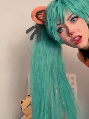 A post by @toastertopia on TikTok caption: garfiku #miku #hatsunemiku #garfield #mikucosplay #garfieldcosplay #garfieldmiku #toastertopia