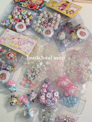 A post by @bobaabie on TikTok caption: enjoy this new asmr beads haul!!! i got all of these from tiktok shops livestreams :)  #beads #beadhaul #beadtok #beadsoup #jewelry #trinkets #beadedjewelry #asmr #DIY #popmart #sanrio #handpaintedbeads 