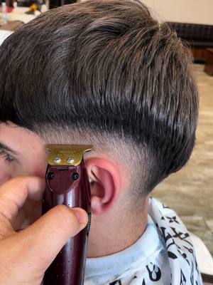 A post by @sunayalpay on TikTok caption: #haircuts #skinfade #barbershopconnect #barbers #barbershop #londonbarbers #lowtaperfade #skinfades #barberstowntv #taperfadehaircut #barberlifestyle #haircutting #taperfade #germany #panasonic #london #haircut 