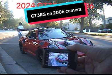 A post by @psuslov on TikTok caption: New technology captured on old technology #porsche #gt3rs #ccd 