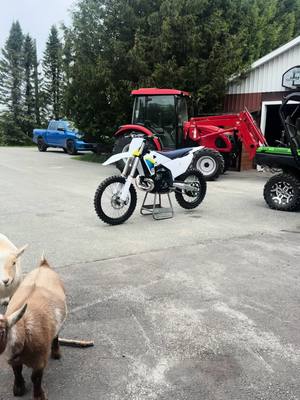 A post by @ontario_sledderz on TikTok caption: @Ontario_sledderz_913 new #2024huskyTC250 #dirtbike #2stroke 