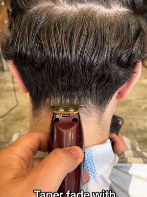 A post by @sunayalpay on TikTok caption: Taper fade with panasonic tutorial #haircuts #skinfade #barbershopconnect #barbers #barbershop #londonbarbers #lowtaperfade #skinfades #barberstowntv #taperfadehaircut #barberlifestyle #haircutting #taperfade #taperfade #germany #panasonic #londonlife #haircut @Wahid 