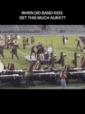 A post by @marching.things on TikTok caption: I WISH THERE WAS A BETTER QUALITY VIDEO OMG #troopers #dci #drumcorps #marchingthings #aura #dci2024 #band #marchingband #guitar #electricguitar #solo [The Troopers 2024 - “Dance With the Devil”] (VIDEO CREDIT: David Brown Vibes)