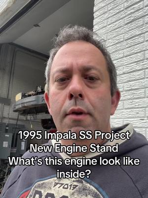 A post by @etchus on TikTok caption: Sorry for the delay. Our project continues. 1995 Impala SS. New engine stand and we get the engine up on it. You will never believe what happens. #impalass #impala #chevy  #chevrolet #frameoff #projectcar #enginestand #harborfreight #workinprogress #foryou #dallas 