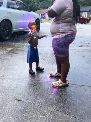 A post by @general_gwop on TikTok caption: Sunday funday 🔫 💦 #outside #waterpark #waterfight #waterguns #familytime 