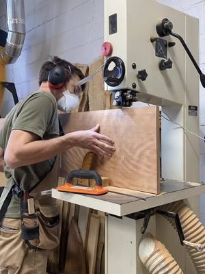 A post by @designedwithpurpose on TikTok caption: I was I was searching for a spectacular board of cherry that I could resaw into thick veneer for the front and make a parquet style radial-ish pattern. I wanted something  beautiful, but not so excessive that it distracted from the primary function of the space.  I found the perfect board it was a unique figured variant known as “ropey cherry”. Rough sawn at 2.125” thick, 14” wide and 12’ long (and very twisted). We were able to get 14 slices, that measured 59” long, 13.5 wide, and  finished around .11” thick. More than enough for all of the panels. I didn’t want to use comercial veneer for this project, because it’s just so thin. I needed some thickness to work with for inlaying the brass. It also felt irresponsible to use such thin wood, as this piece is meant to last generations. I can confidently say that all of the veneered panels and doors can be easily sanded and refinished without the risk of blowing through.  #designedwithpurpose #baltimore #customfurniture