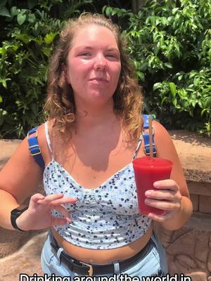 A post by @alenafreyhofer on TikTok caption: #drinkingaroundtheworld #epcot #disneyworld 🥂🌎