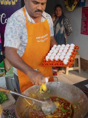 A post by @markwiens on TikTok caption: Unbelievable Indian street food skills!! 🇮🇳🥚 King of egg curry and egg fried rice! #tiktokfood #IndianFood #streetfood  📍 Uncle Egg Rice, Bangalore, India