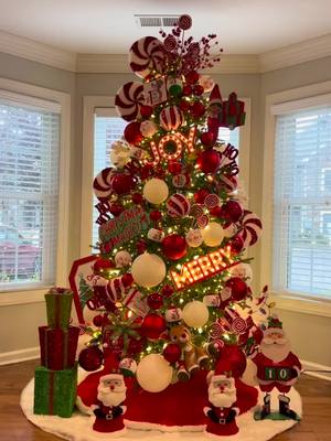 A post by @cozy_christmas07 on TikTok caption: #santahelper #elf #christmastree #holidaycheer #explorepage 