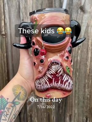 A post by @kenneycollection on TikTok caption: #onthisday one of my favorite tumbler sculpts and my kiddos talking in the background was just too perfect 😂❤️ . . . . #3dtumbler #polymerclay #clayart #tumblermaker #tumblerart #sculpting #polymerclayartist #monsterart #creepyart #spookyart 