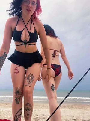 A post by @itza.lani on TikTok caption: i cant walk in sand but ignore me and look at her😍. #wlw #fyp #lestoker🌈 #xybca #fakebodyy⚠️ 