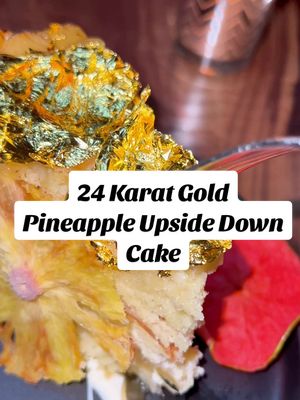 A post by @caycharice on TikTok caption: Easily one of the best pineapple upside down cakes I've ever had. Topped with 24 karat gold leaves?? Yeah give me 14 of them rn!!! 🍍🍰⭐️##giveme14ofthemrightnow##pineappleupsidedowncake##charlotte##cravedessertbar