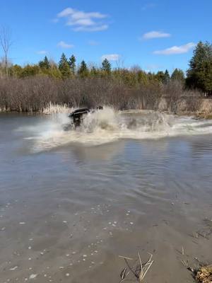 A post by @conky_xmr on TikTok caption: Little water wheelie #canamoutlander850xmr #yoshi #crazybrownertuned #motohavoks #cvtech #fyp #msawheels #gasguzzler 