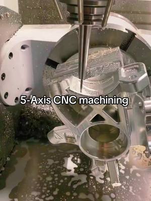 A post by @richconncnc on TikTok caption: 5-Axis CNC machining.#cncmachining #precisionmachining #5axiscnc #customparts #metalwork #cncmachiningservice #cncmanufacturing #foryou 