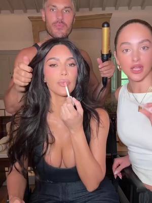 A post by @kimkardashian on TikTok caption: Get ready with me @SKKN BY KIM  Lip Gloss in NUDE 01 Lip Liner in NUDE 12  Highlighter in Honey Glow