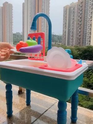 A post by @moombioom on TikTok caption: Smart chef play kitchen #kitchen#toys #funnytiktok #Summer