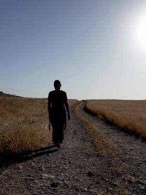 A post by @nadiasinitiative on TikTok caption: "The loss of my past has made it impossible for me to think about my future." A decade after ISIS began their genocidal campaign against the Yazidis, Katrin struggles with the loss of her family and life before the genocide. #JusticeForYazidis #ProtectMinorities #EndCRSV #10YearsMissing #OurWorkIsNotDone #SurvivorStory #SupportSurvivors