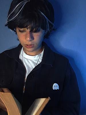 A post by @aceofrems on TikTok caption: This is about Ashe ofc :) - I broke the book right before filming this 😭 #fyp #jrwi #jrwicosplay #williamwisp #williamwispcosplay #aceofrems 